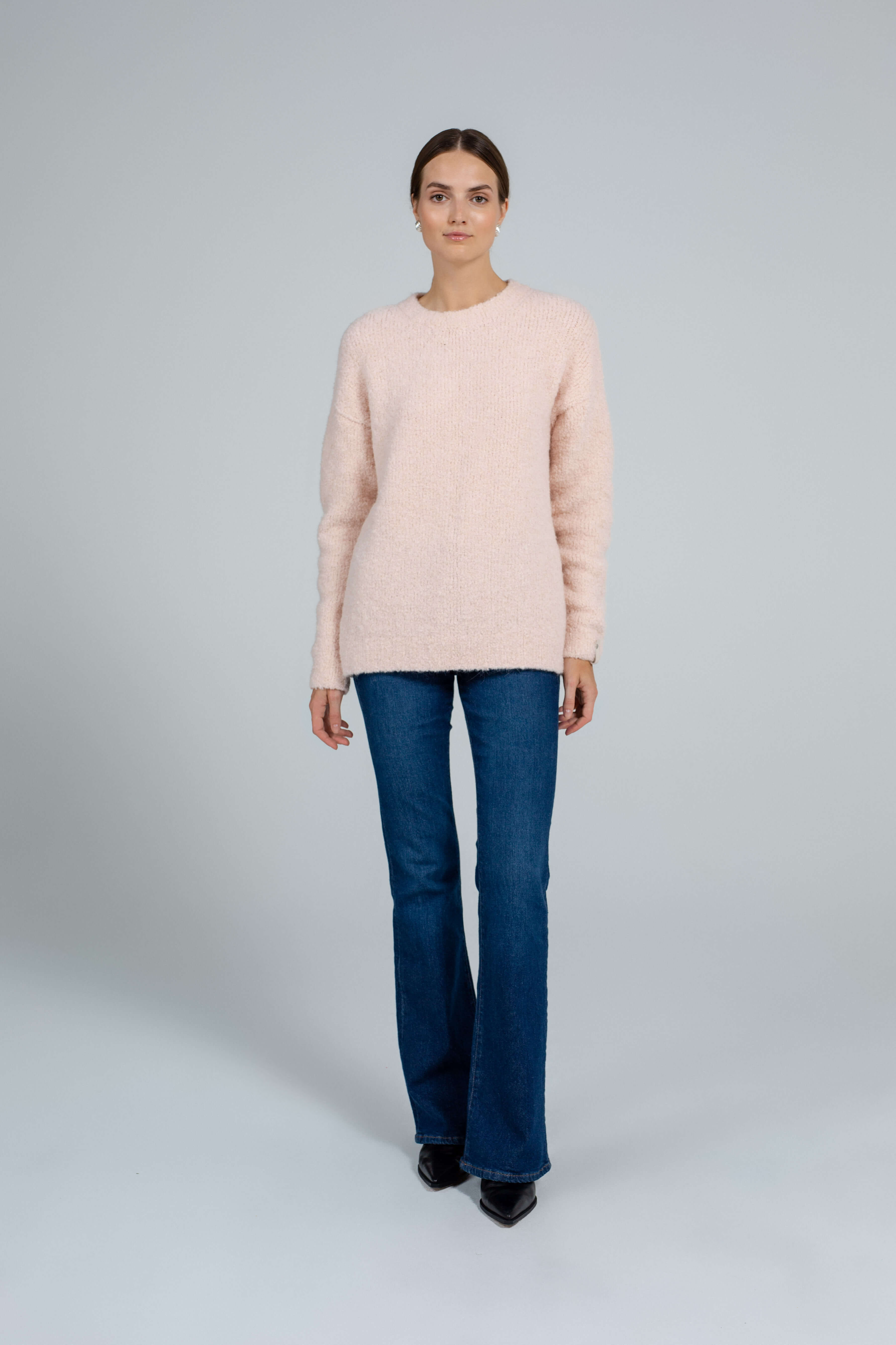 Boucle light peach sweater sample