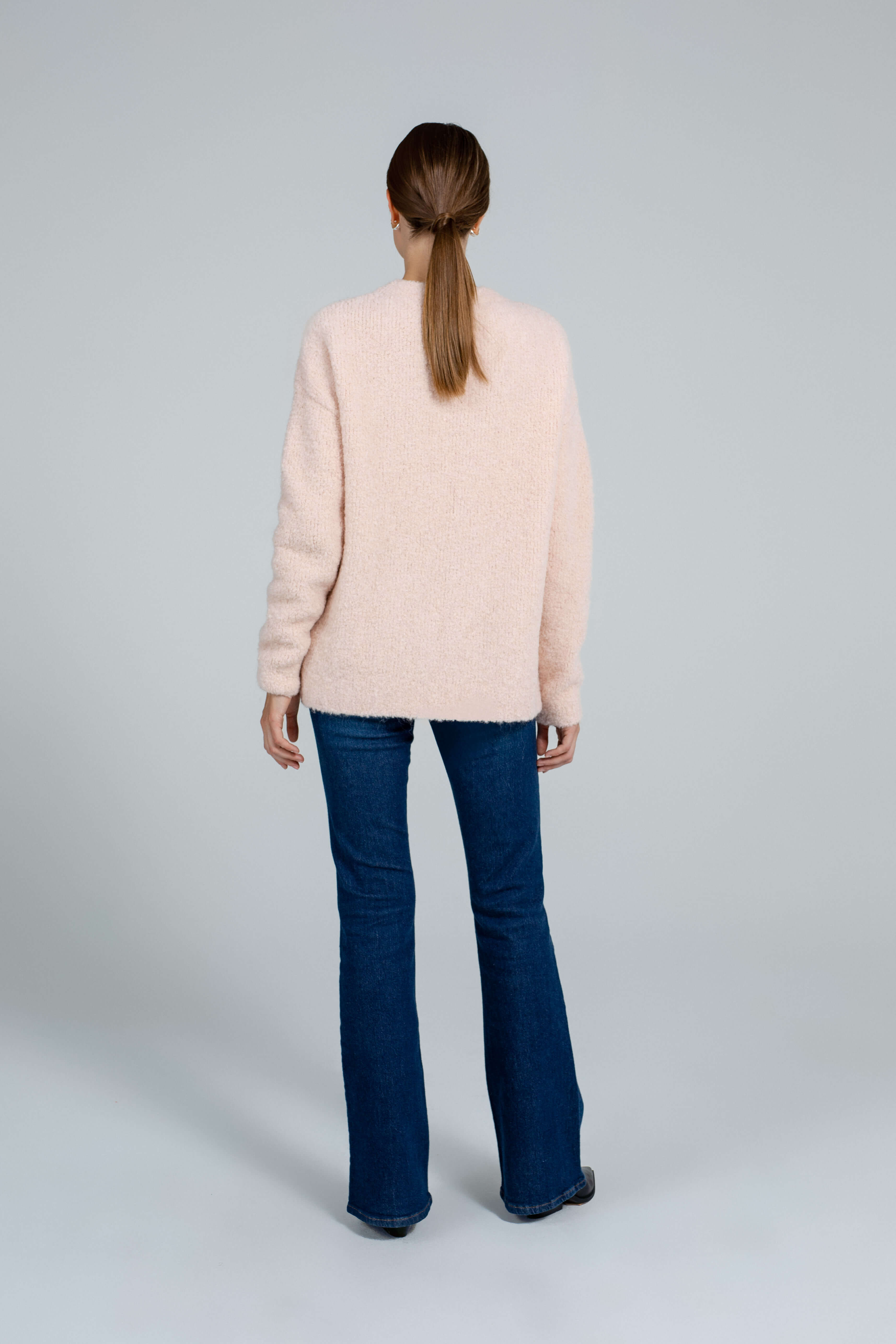 Boucle light peach sweater sample