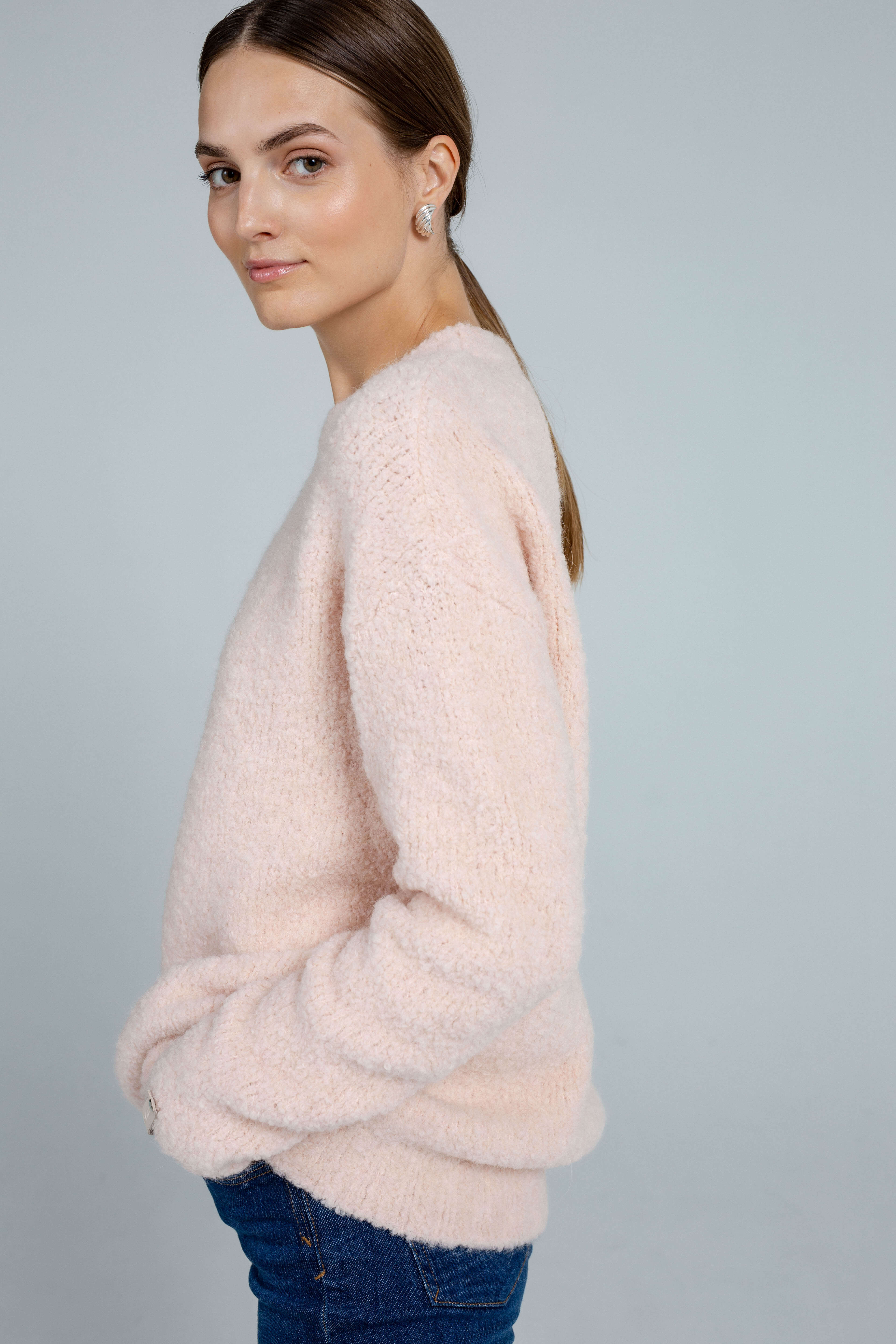 Boucle light peach sweater sample